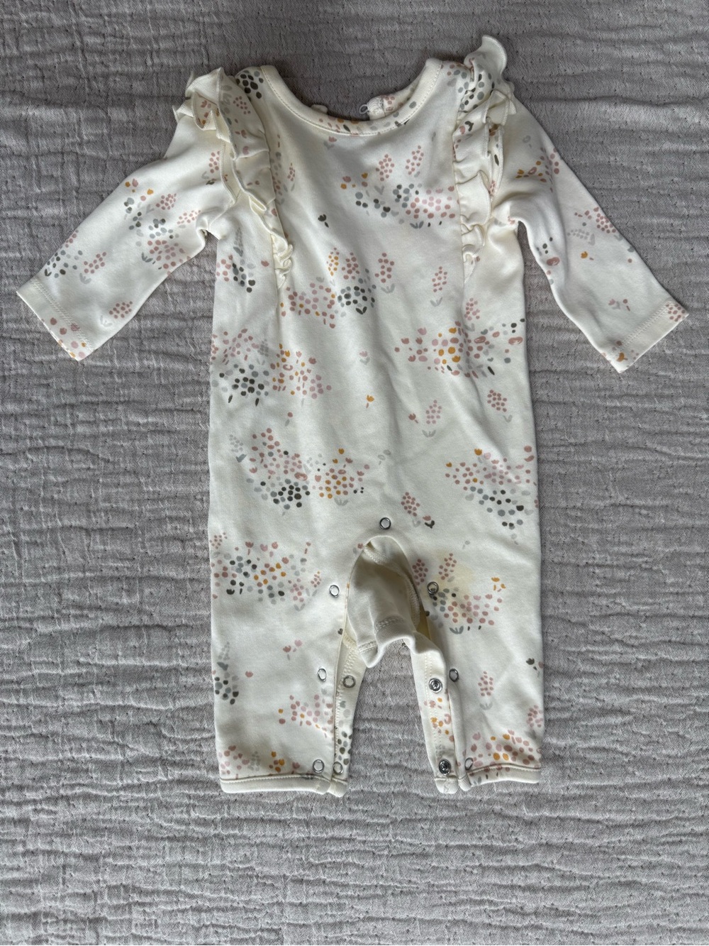 Cream Ruffle-Trim Baby One-Piece with Pastel Dot Pattern